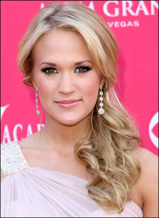 carrie underwood hair. Begin by brushing hair with a